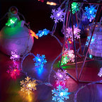 Multicolor snowflake string lights in a decorative display
