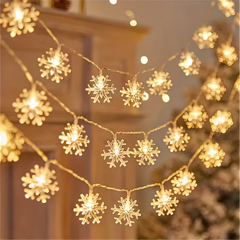 Warm yellow snowflake string lights in a decorative display
