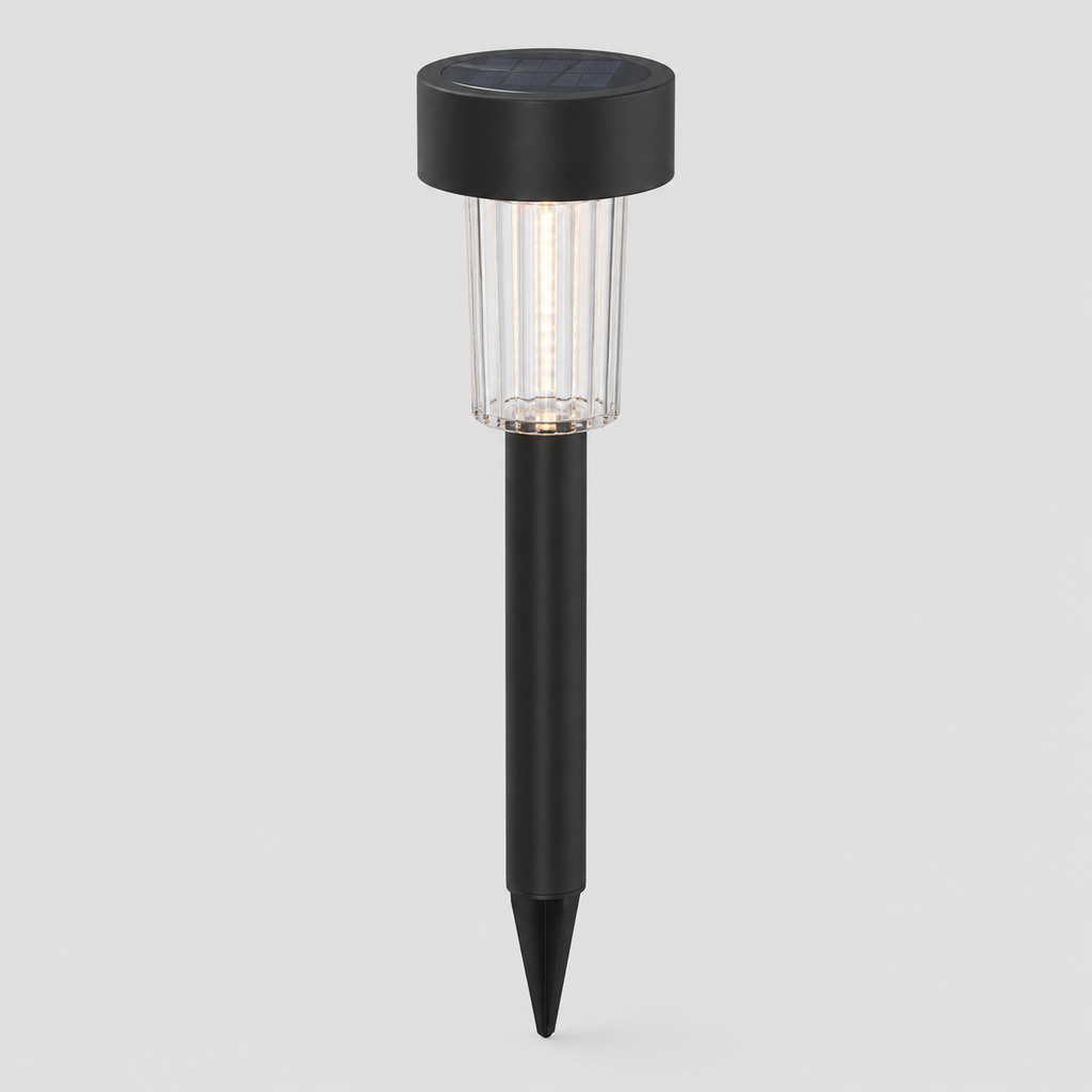 A solar-powered ground stake light with a black top cap, clear ribbed glass shade, and black stake, shown against a light gray background.