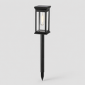 A black solar-powered outdoor landscape light with a rectangular glass lantern-style shade and a stake base, shown against a light gray background.