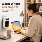White space heater beside a desk with woman working on a laptop