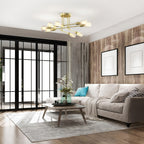 Gold Sputnik ceiling light with eight bulbs in a modern living room.