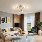 Gold Sputnik ceiling light with six bulbs above a furnished living room.