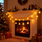 Star and globe string lights glowing in a room with a decorated Christmas tree.
