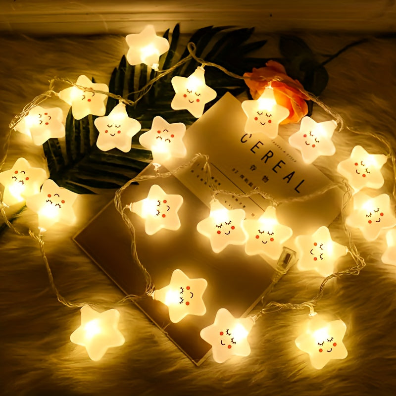Star fairy lights with smiling faces arranged beside decorative flowers.