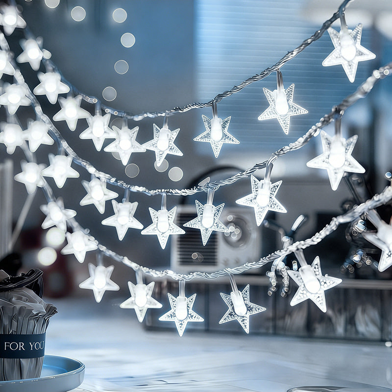 White star fairy lights arranged in hanging strands