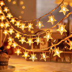 Warm white star fairy lights in a hanging display