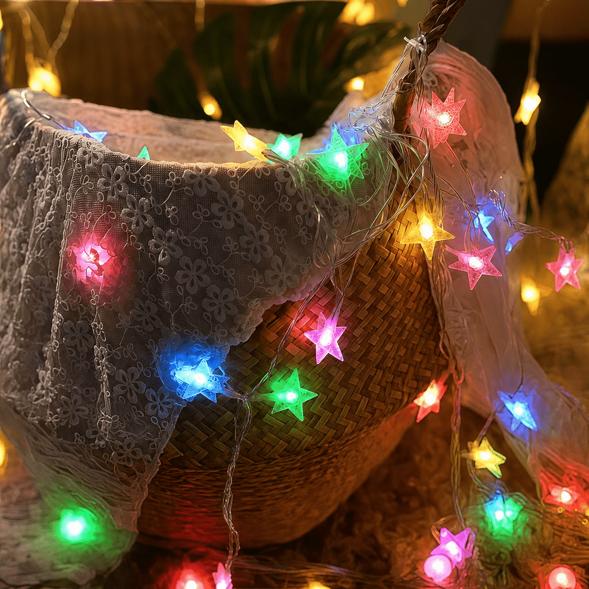 Multicolor star lights draped around fabric