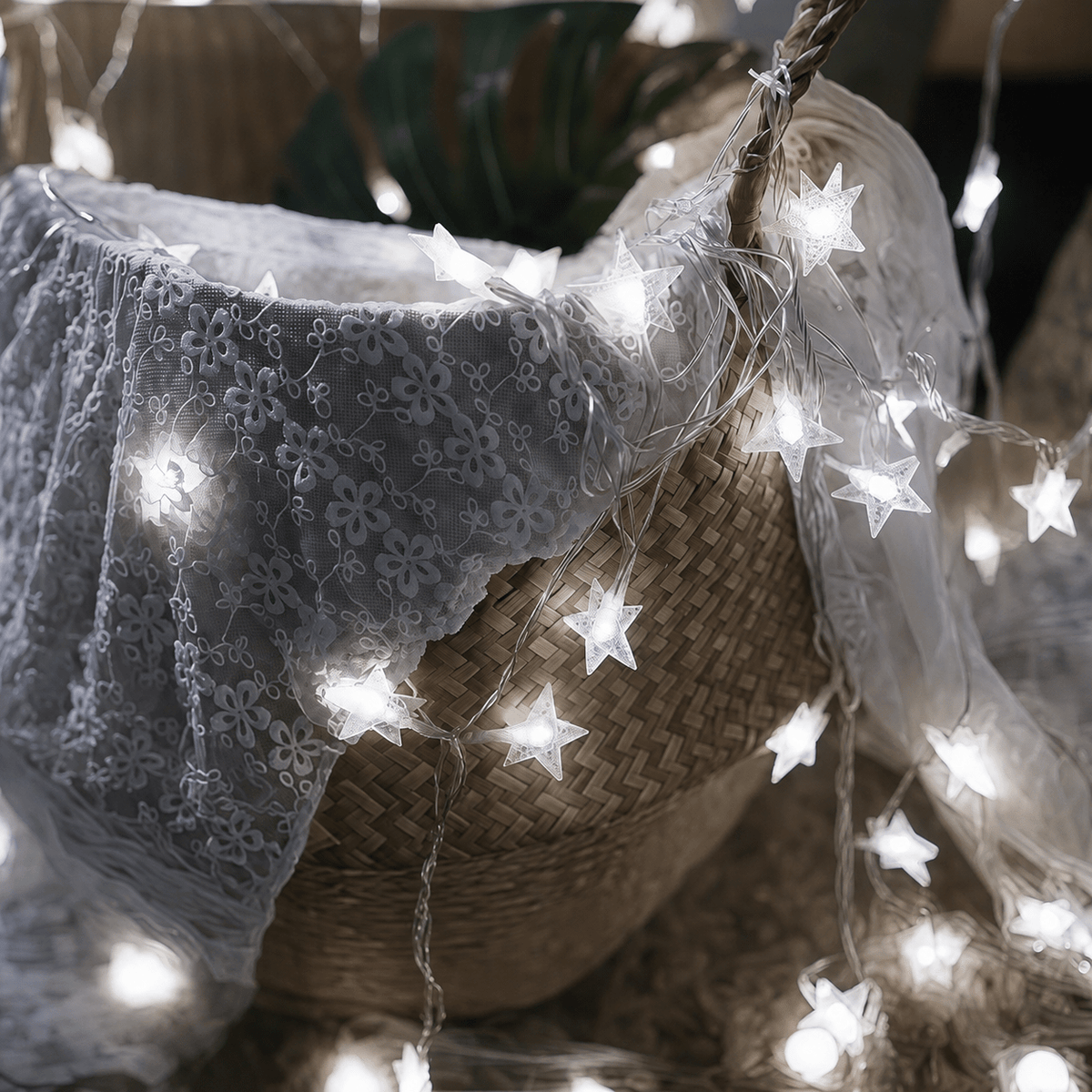 White star lights draped around a fabric display