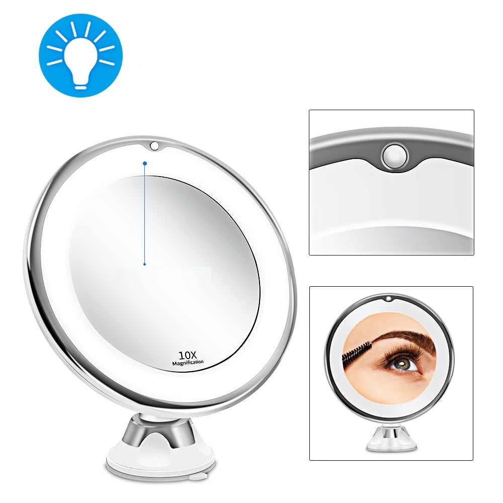 Magnifying suction mirror with three light modes