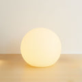 Cordless LED moon table lamp in the 12 cm size.