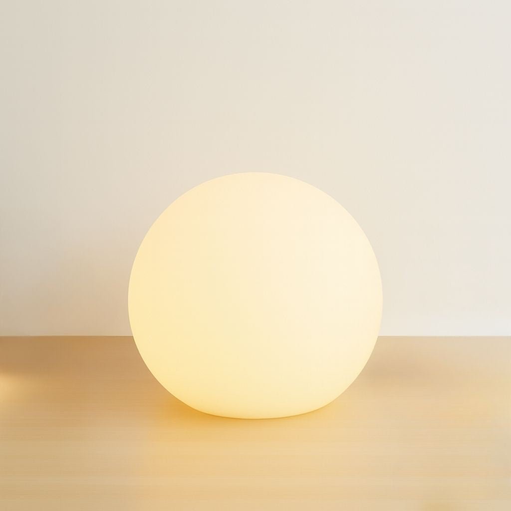 Cordless LED moon table lamp in the 12 cm size.