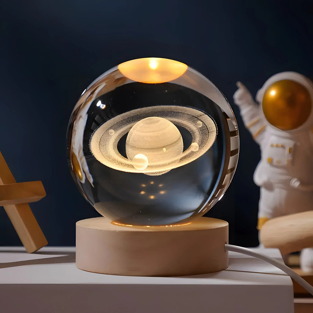 Crystal sphere table lamp with Saturn engraving on a wooden light base
