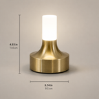 Gold table lamp on a light background with visible height and width measurements.