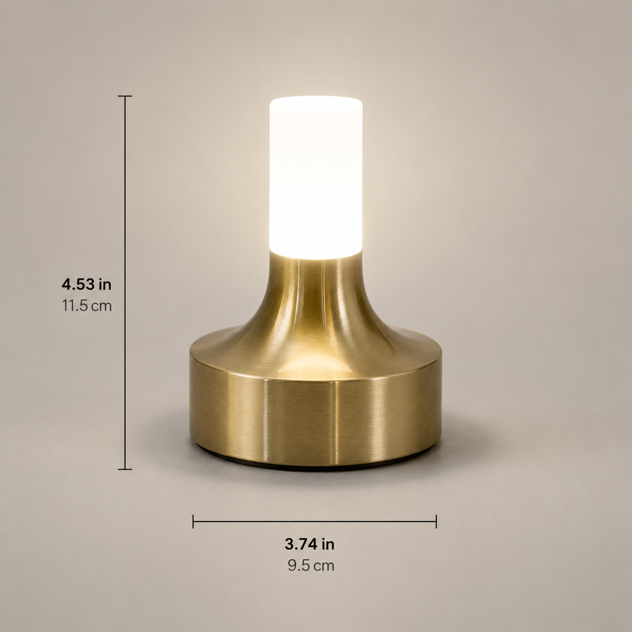 Gold table lamp on a light background with visible height and width measurements.
