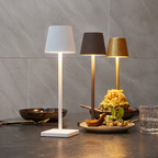 white, brown and gold rechargeable table lamps on a dining table