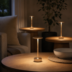 Rechargeable touch table lamps creating pools of warm light.