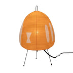 Table lamp with an orange geometric shade isolated on white.