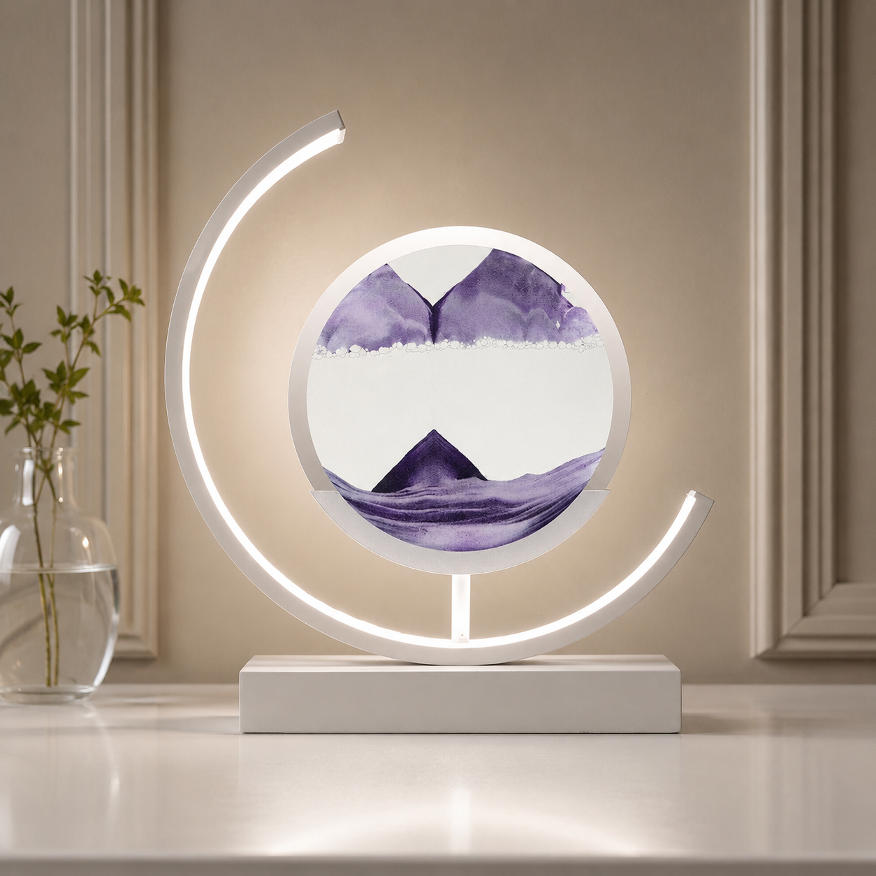 Purple quicksand table lamp with a white frame glowing in a warm greige setting.