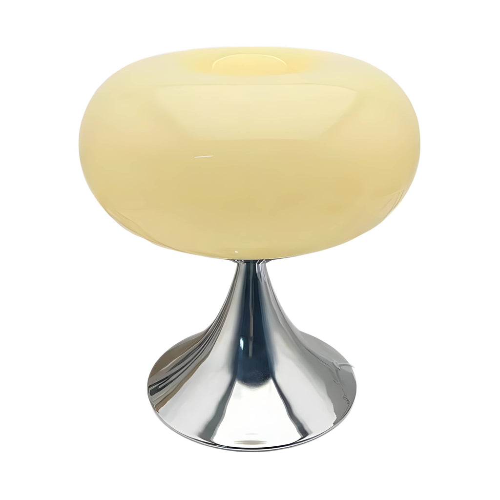 Beige donut table lamp with a rounded glass shade and metal pedestal.