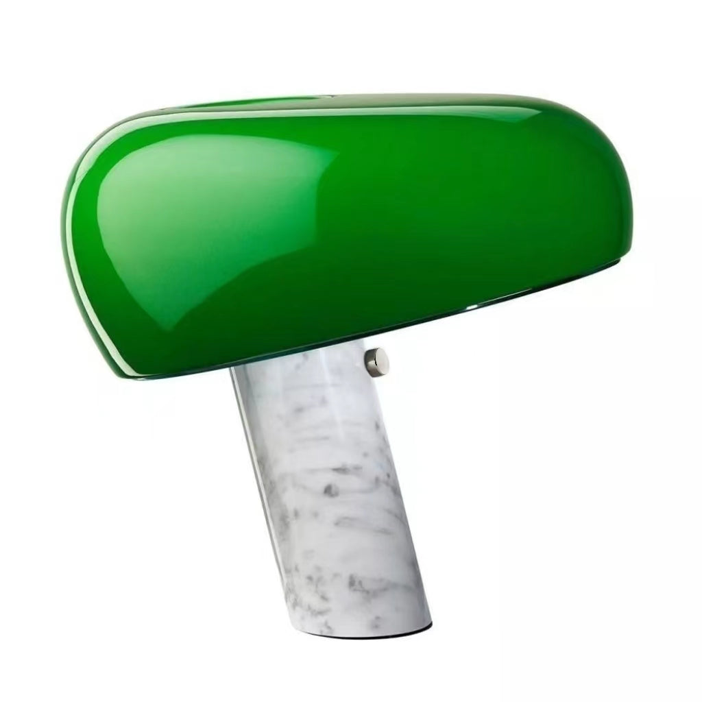 Green table lamp with a broad glossy shade and angled marble base.