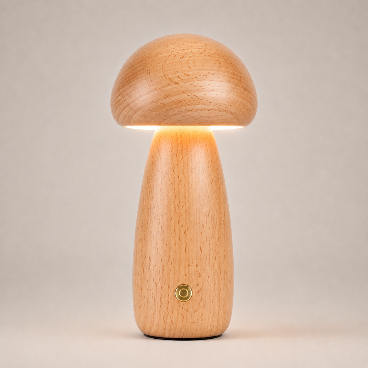 Table lamp with a rounded amber dome shade and tall tapered base on a light beige studio background.