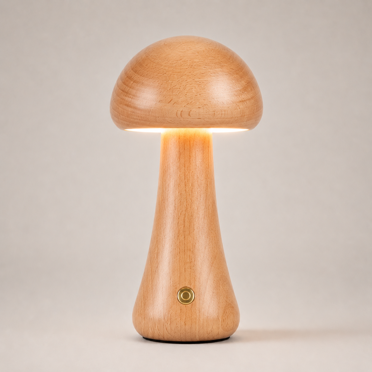 Natural wood-look table lamp glowing against a light gray studio background.