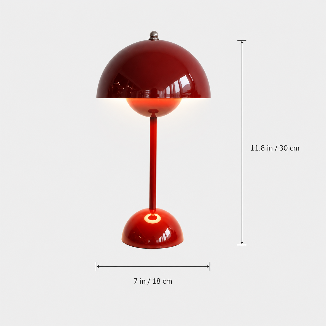 Dimension guide showing the red table lamp from the front with height and width markers.