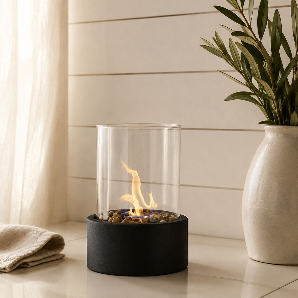 black tabletop fireplace burning in a bright living-room corner