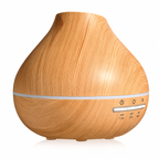 Teardrop aroma diffuser with a simulated wood grain finish on a white background