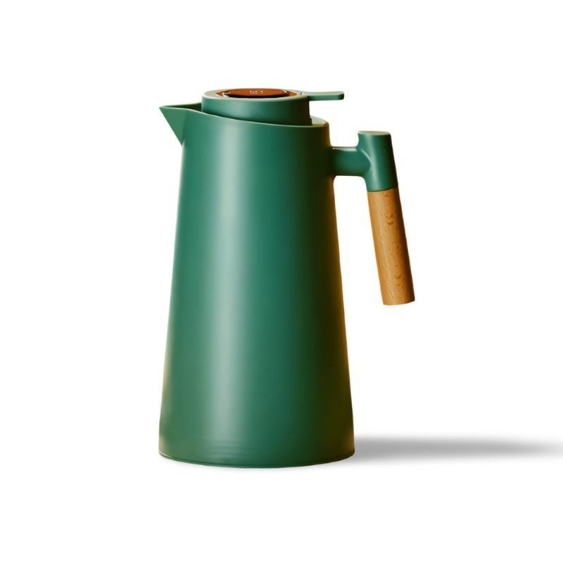 Thermal coffee carafe in a tabletop coffee serving scene.