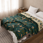 teal reversible bird throw blanket styled across a bright bed