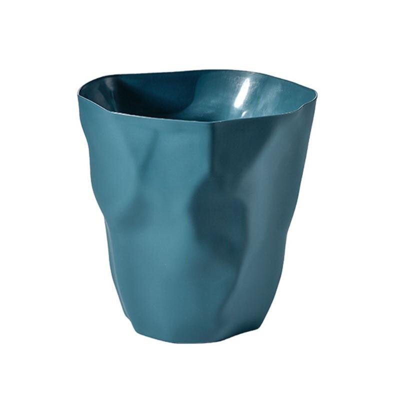 Trash can in navy blue isolated on a white background.
