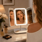 Tri fold makeup mirror in use at a vanity
