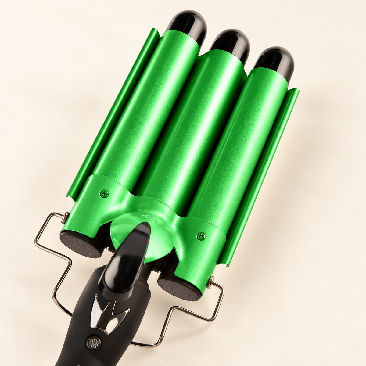 Green triple barrel hair waver with three barrels and a black handle