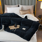 Black velvet plush comforter in a bedroom