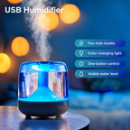 Humidifier with blue lighting and labels for mist modes, light and one button control