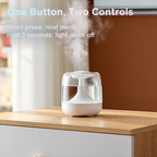 White humidifier on a windowsill with button instructions