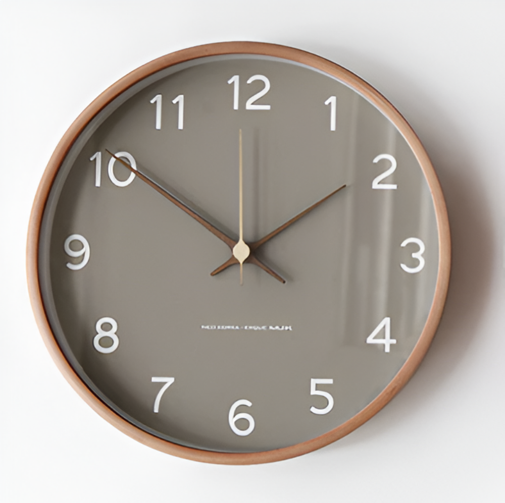 Gray wall clock with a round wooden frame and clear white numerals