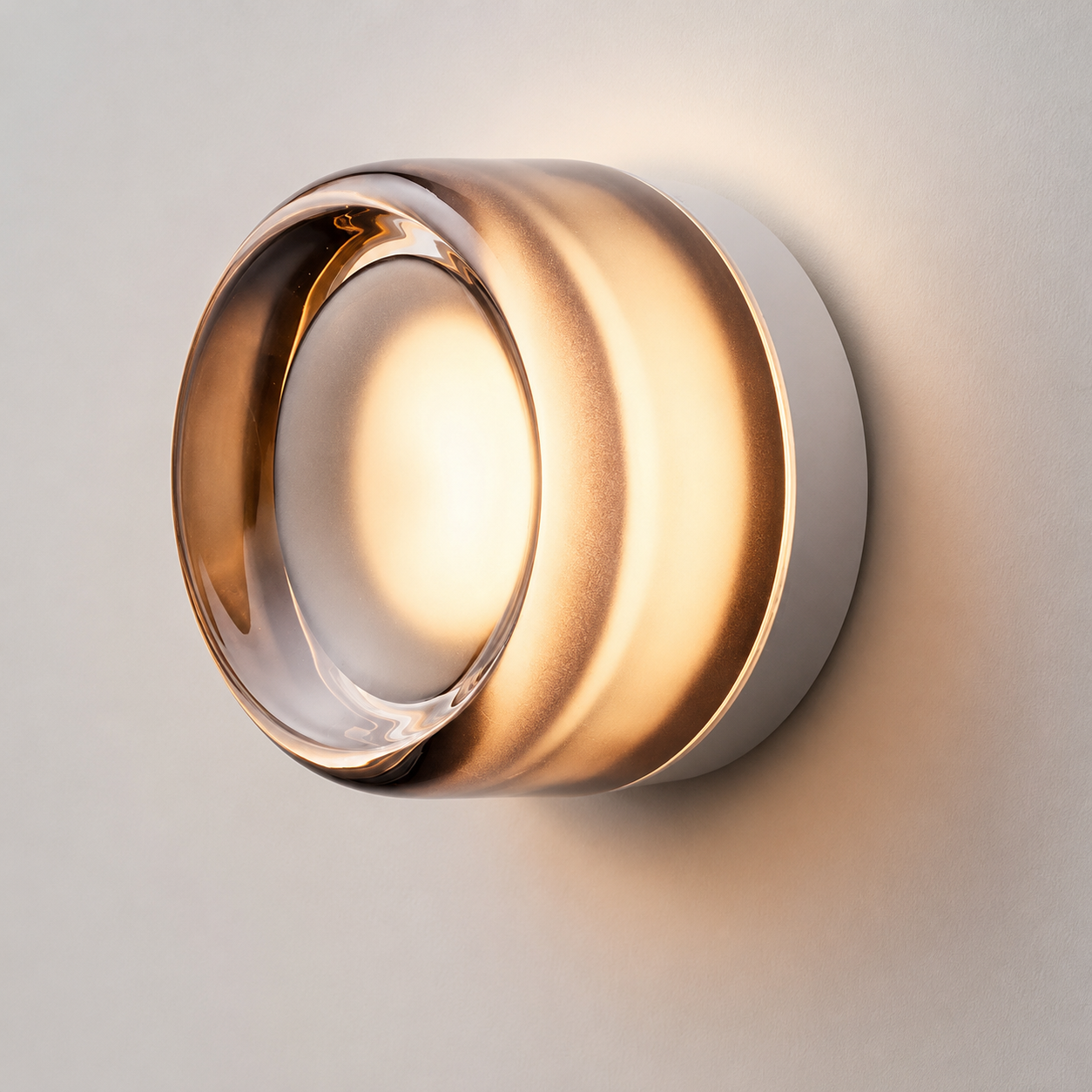 Round acrylic LED wall lamp glowing warm white against a neutral wall.