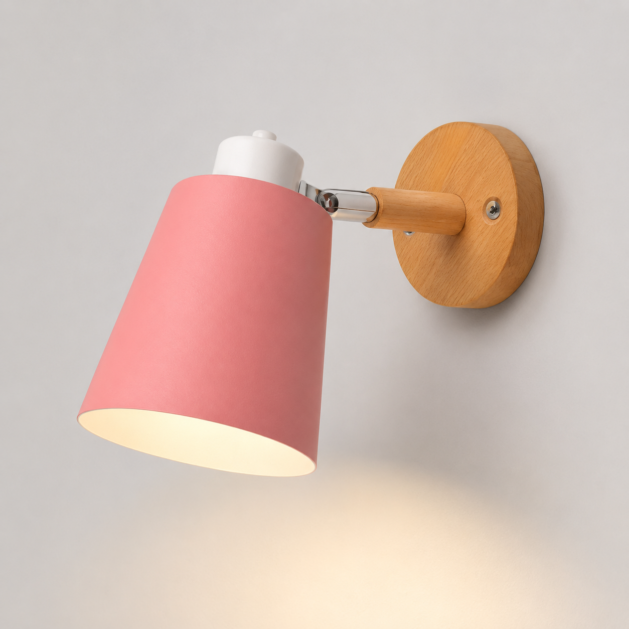 Adjustable cone wall lamp with a solid wood mounting base, glowing warm white against a neutral wall. 