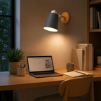 Adjustable cone wall lamp with a solid wood mounting base, glowing warm white against a neutral wall. 