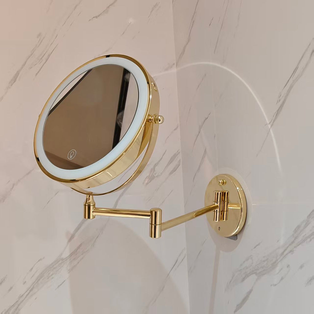 Gold wall mounted makeup mirror with extendable arm