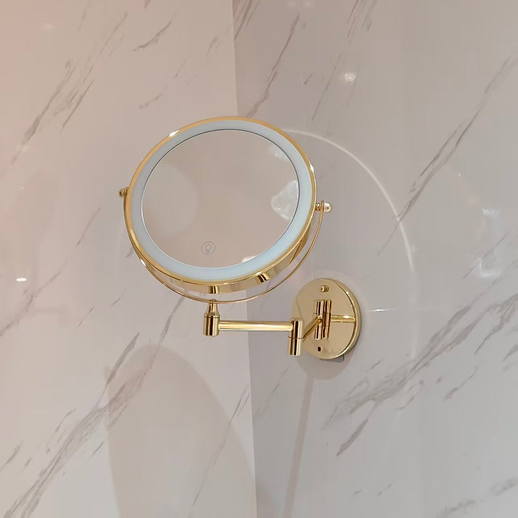 Gold wall mounted mirror folded toward the wall