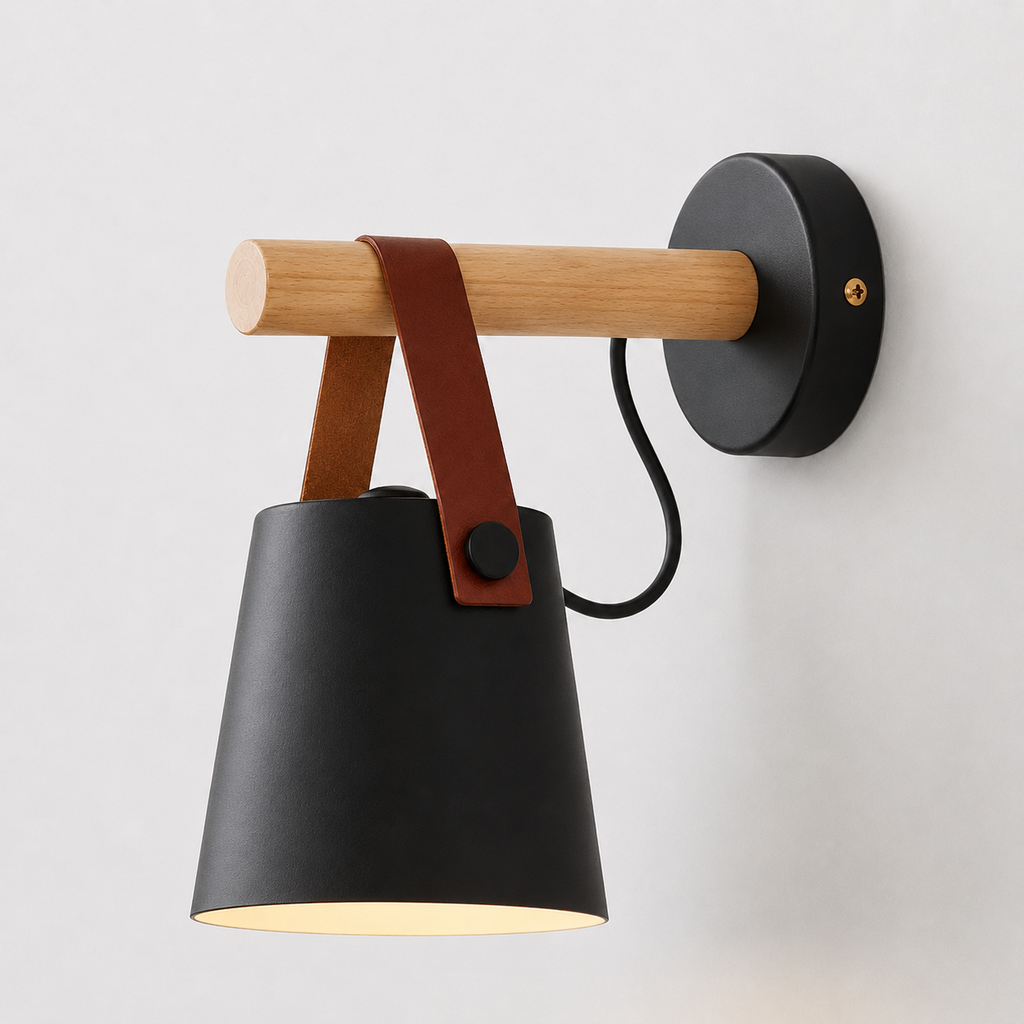 Black wall sconce with a hanging iron shade, wood support, brown strap, and downward-facing opening.