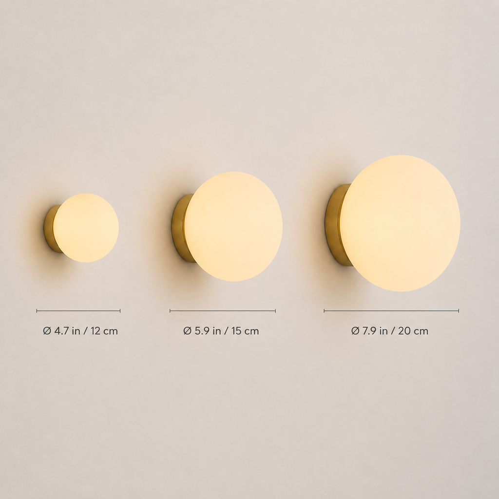 Three round wall sconce sizes are displayed side by side on a light background.