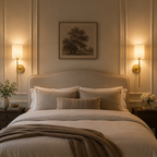Wireless wall sconces mounted beside a bed in a softly illuminated bedroom.