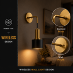 Gold and black wireless wall sconce highlighting the brushed brass finish and adhesive mounting plate.