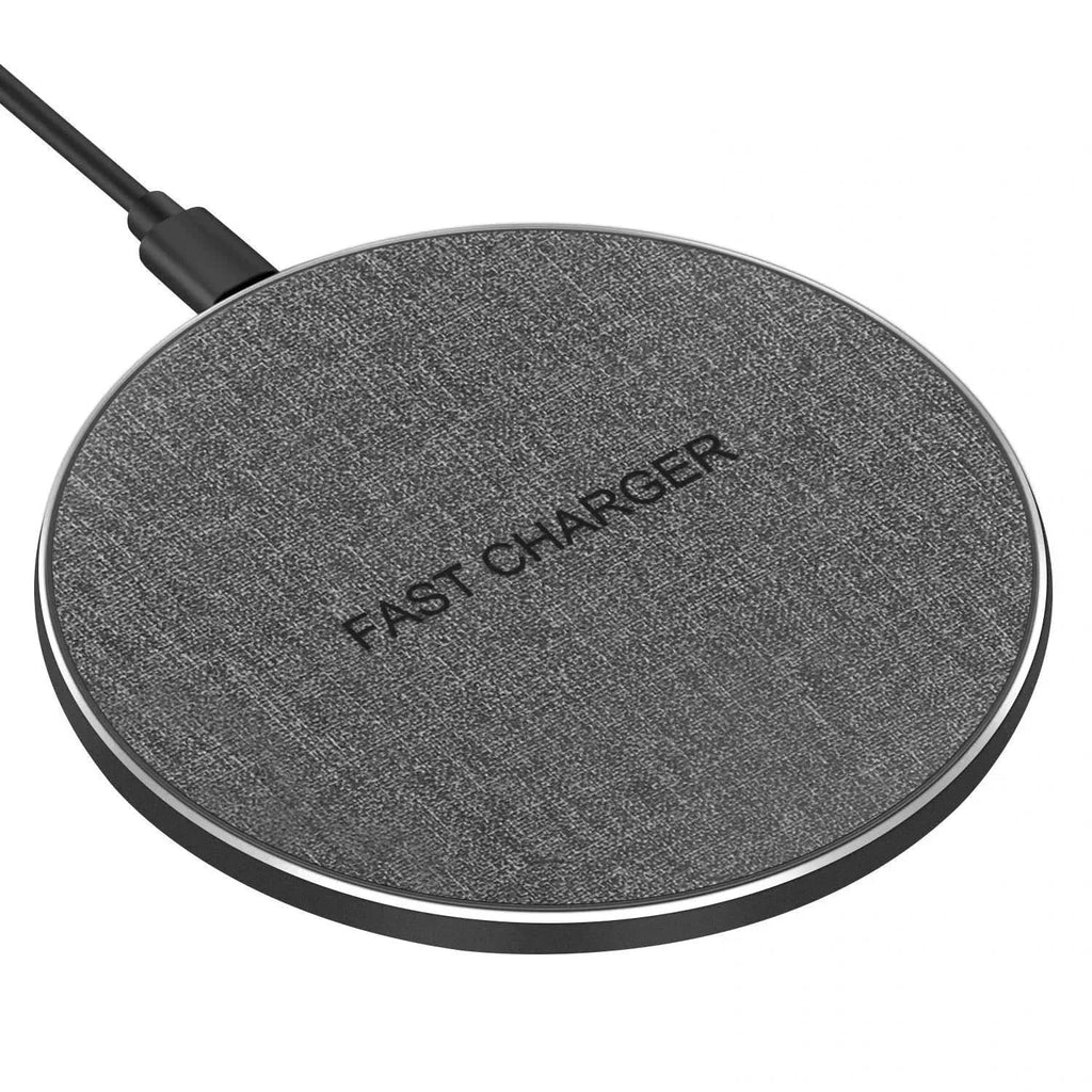 Round single wireless charging pad with attached power cable.