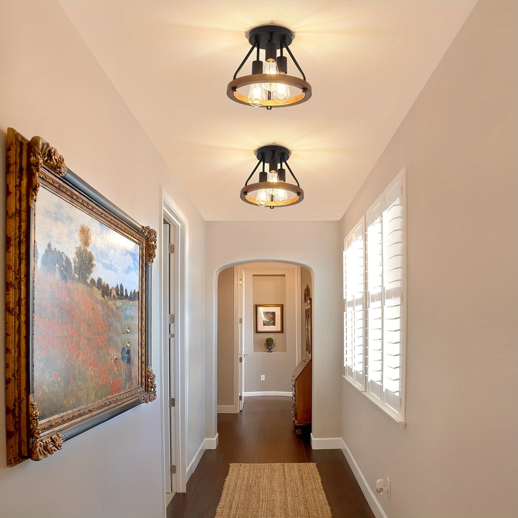 Wood and black metal ceiling fixtures in a bright hallway